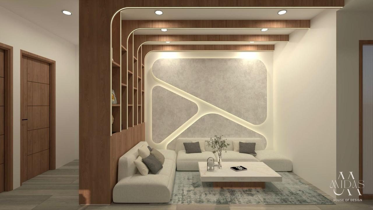 Lounge with curved light coves and a sculpted feature wall — interior design by MIDAS House of Design, Bangalore
