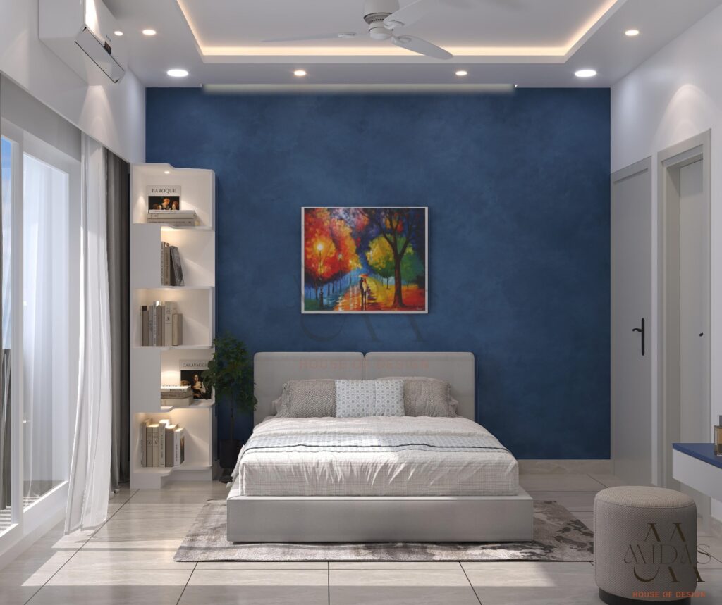 Master bedroom in Bangalore — deep navy accent wall, white LED display shelves, upholstered grey bed, vibrant artwork, modern luxury interior